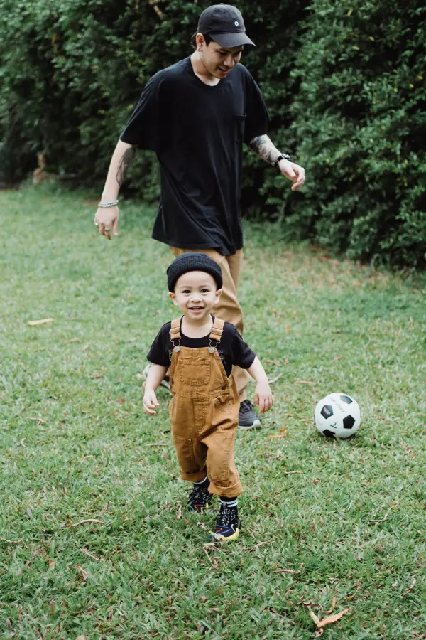Father and son playing in the backyard
